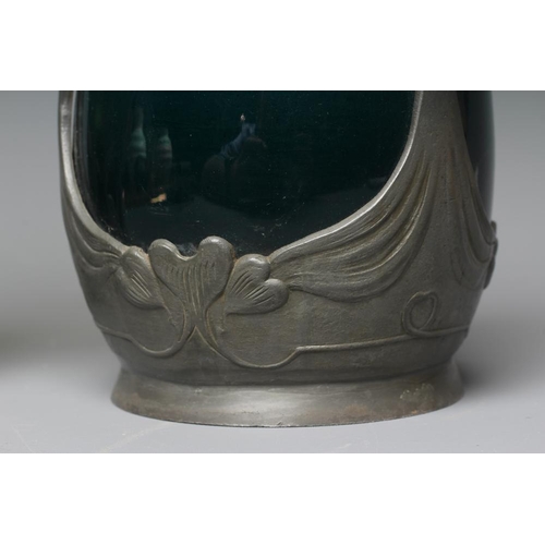 494 - AN ART NOUVEAU EARTHENWARE VASE BY J. VON SCHWARZ of bulbous form with rounded trefoil neck in a str... 
