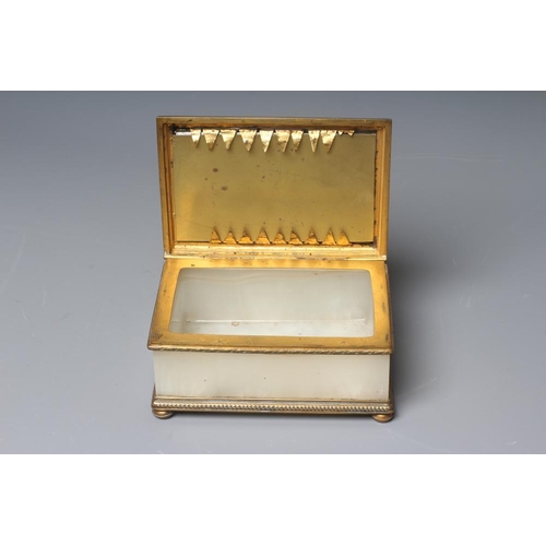 501 - A DUNHILL ONYX CASKET, early 20th century, of plain oblong form with four polished panels inset to b... 