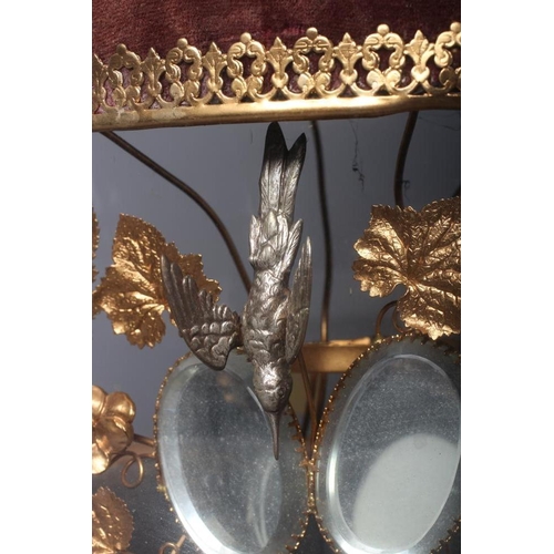 503 - A GLOBE DE MARIEE, French 19th century, the ivy leaf stamped gilt metal wirework frame centred by a ... 