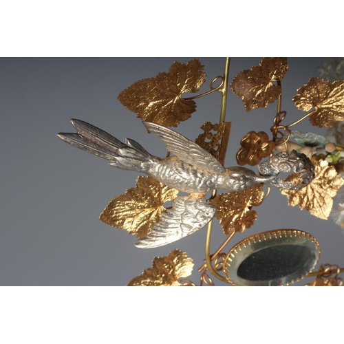 503 - A GLOBE DE MARIEE, French 19th century, the ivy leaf stamped gilt metal wirework frame centred by a ... 