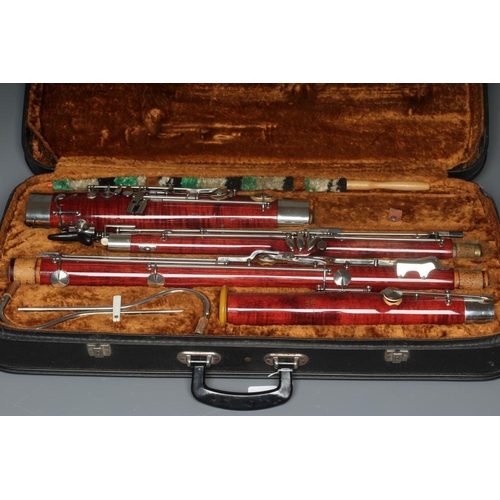 504 - A CZECHOSLOVAKIAN MAPLE LAFLEUR BASSOON, imported by Boosey & Hawkes, with silvered fittings, serial... 