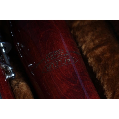 504 - A CZECHOSLOVAKIAN MAPLE LAFLEUR BASSOON, imported by Boosey & Hawkes, with silvered fittings, serial... 