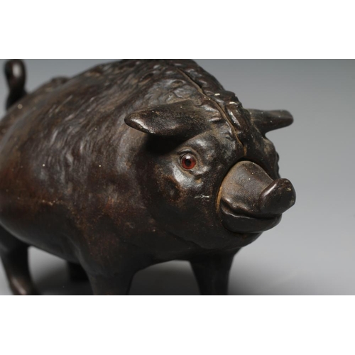 505 - A BUTCHER'S SHOP CAST IRON PIG COUNTER BELL, late Victorian, with amber glass eyes, the clockwork me... 