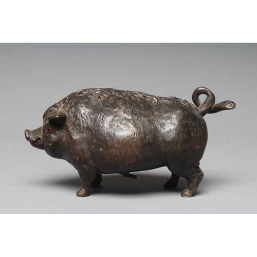 505 - A BUTCHER'S SHOP CAST IRON PIG COUNTER BELL, late Victorian, with amber glass eyes, the clockwork me... 