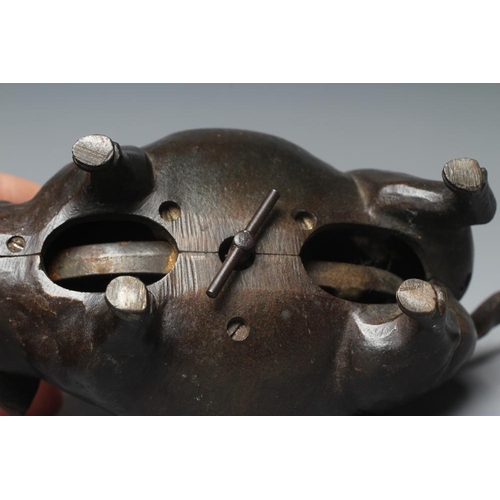 505 - A BUTCHER'S SHOP CAST IRON PIG COUNTER BELL, late Victorian, with amber glass eyes, the clockwork me... 