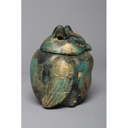507 - A JAPANESE GREEN PATINATED METAL OWL BOX, modern, the head forming the cover, with gilded highlights... 