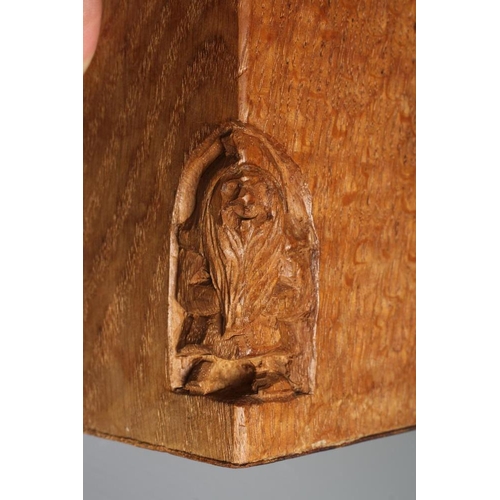 516 - A PAIR OF THOMAS WHITTAKER OAK BOOKENDS of domed form carved with a Yorkshire Rose and incised gnome... 