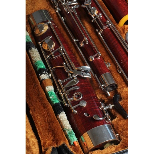 504 - A CZECHOSLOVAKIAN MAPLE LAFLEUR BASSOON, imported by Boosey & Hawkes, with silvered fittings, serial... 