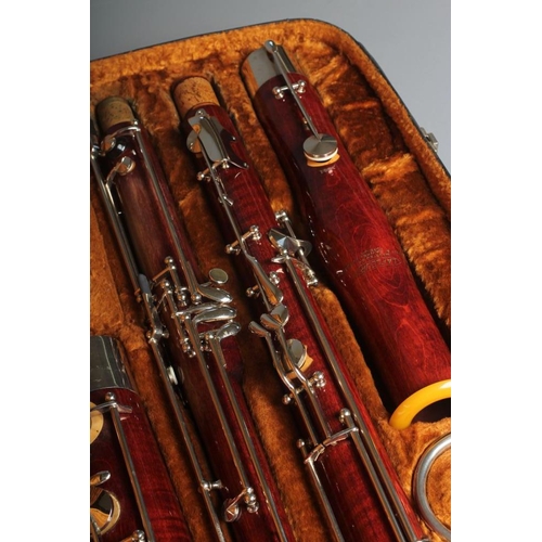 504 - A CZECHOSLOVAKIAN MAPLE LAFLEUR BASSOON, imported by Boosey & Hawkes, with silvered fittings, serial... 