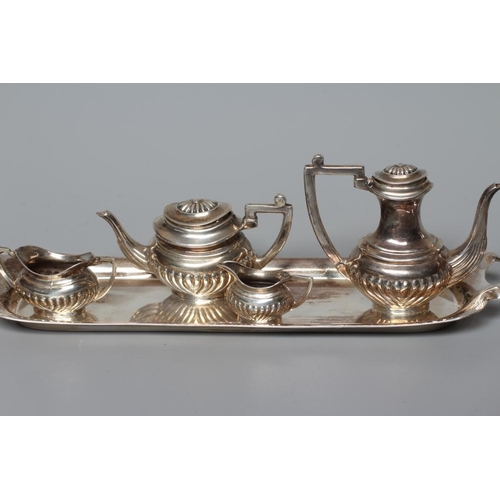 130 - AN ELIZABETH II SILVER MINIATURE FOUR PIECE TEA AND COFFEE SERVICE by Alan M Weisrose, London 1977, ... 