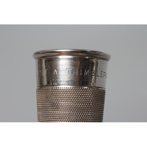 131 - AN ELIZABETH II NOVELTY SILVER THIMBLE TOT by Charles Horner, Chester 1950, engraved 'Just a Thimble... 