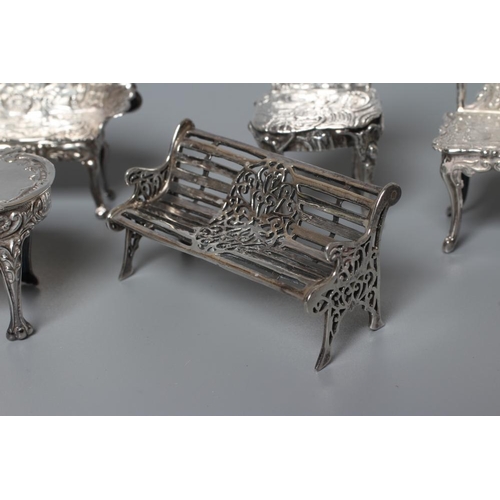 132 - AN ELIZABETH II MINIATURE SILVER FOUR PIECE SALON SUITE by David Hollander & Son, Birmingham 1976, c... 