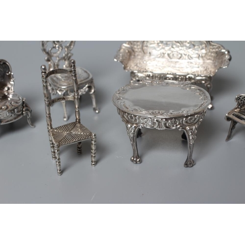 132 - AN ELIZABETH II MINIATURE SILVER FOUR PIECE SALON SUITE by David Hollander & Son, Birmingham 1976, c... 