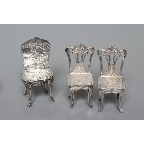 132 - AN ELIZABETH II MINIATURE SILVER FOUR PIECE SALON SUITE by David Hollander & Son, Birmingham 1976, c... 
