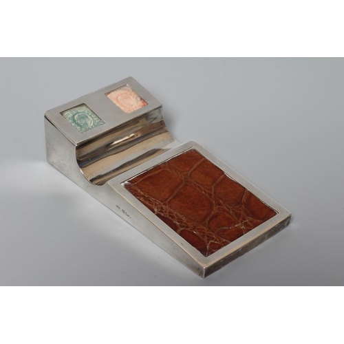 142 - OF PHILATELIC INTEREST - A GEORGE V SILVER STAMP/PEN HOLDER by Levi & Salaman, London (date rubbed),... 
