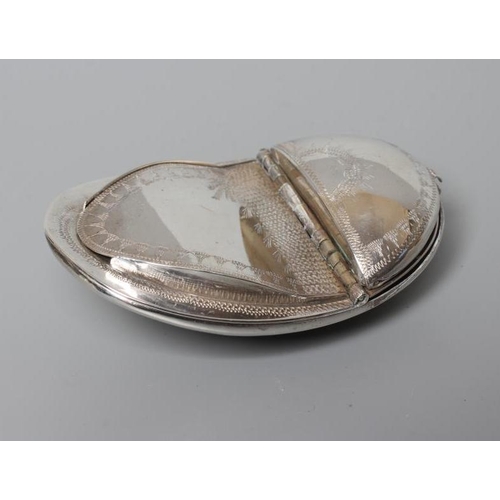 143 - OF PHILATELIC INTEREST - A SNUFF/STAMP BOX, unmarked, of concave oval form with engraved decoration ... 