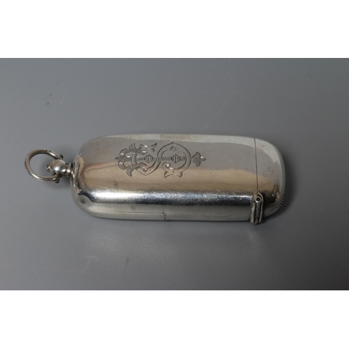 149 - A LATE VICTORIAN SILVER VESTA AND COMBINED SOVEREIGN HOLDER, maker's mark JMM, Birmingham 1894, of p... 