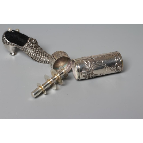152 - A LATE VICTORIAN SILVER NOVELTY SHOE PIN CUSION, no maker's mark, Birmingham 1900, with Louis heel a... 