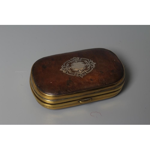 163 - A SILVER MOUNTED TORTOISESHELL SNUFF BOX, mid 18th century, of rounded oblong form with a piquework ... 