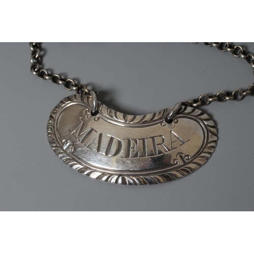 164 - A SCOTTISH PROVINCIAL SILVER MADEIRA LABEL by Edward Livingstone (initials stamped twice), Dundee c.... 