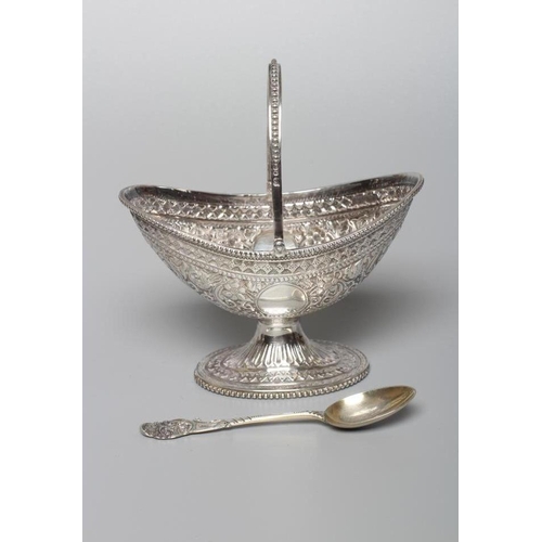 171 - A VICTORIAN SILVER OVAL SUGAR BASKET by John Aldwinckle & Thomas Slater, London 1887, chased and rep... 