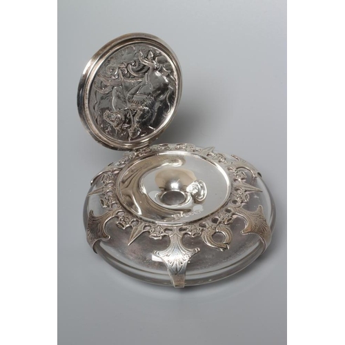 172 - A LATE VICTORIAN SILVER MOUNTED INKWELL by Charles Stuart Harris, London 1901, the squat clear glass... 