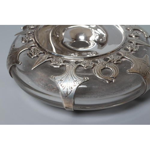 172 - A LATE VICTORIAN SILVER MOUNTED INKWELL by Charles Stuart Harris, London 1901, the squat clear glass... 
