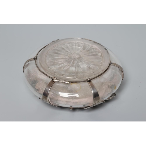 172 - A LATE VICTORIAN SILVER MOUNTED INKWELL by Charles Stuart Harris, London 1901, the squat clear glass... 