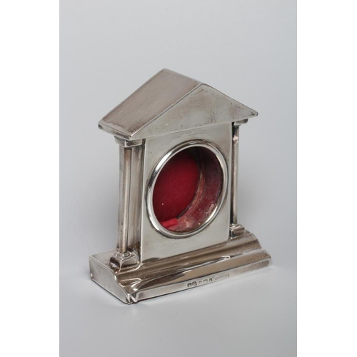177 - AN EDWARDIAN SILVER POCKET WATCH HOLDER, maker's mark A&B, Birmingham 1903, the triangular portico s... 