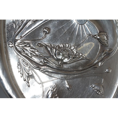 179 - AN EDWARDIAN SILVER ART NOUVEAU DRESSING TABLE TRAY, maker's mark rubbed, Birmingham 1909, of quatre... 