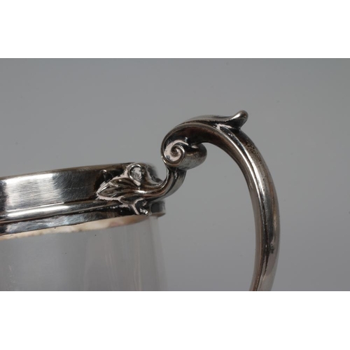 185 - AN EARLY VICTORIAN SILVER MUG by John Wilmin Figg, London 1856, the clear glass cylindrical body wit... 