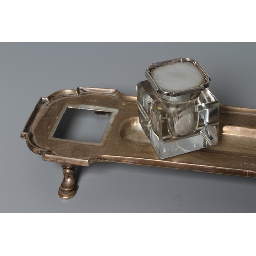 188 - AN ART DECO SILVER DESK STANDISH by Adie Bros., Birmingham 1931, of elongated oblong form with shape... 