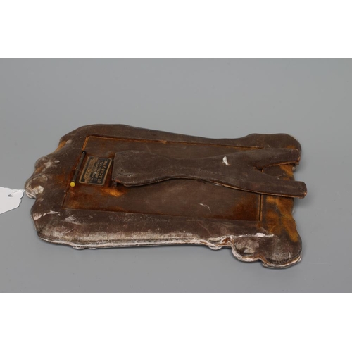 192 - AN EDWARDIAN SILVER STRUT BACK PHOTOGRAPH FRAME by Henry Matthews, Chester 1904, of shaped oblong fo... 