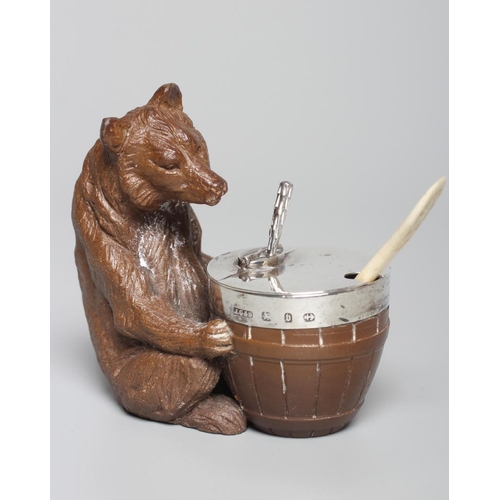 169 - A LATE VICTORIAN SILVER MOUNTED DARK BROWN STONEWARE NOVELTY MUSTARD, modelled as a seated bear with... 