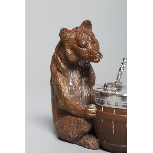 169 - A LATE VICTORIAN SILVER MOUNTED DARK BROWN STONEWARE NOVELTY MUSTARD, modelled as a seated bear with... 