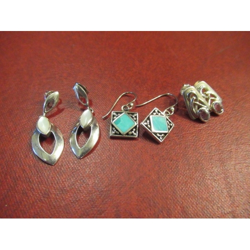 216 - THREE PAIRS OF SILVER EARRINGS