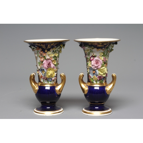31 - A PAIR OF BLOOR DERBY PORCELAIN SMALL CAMPANA URNS encrusted with flowers on a gilt highlighted coba... 