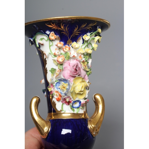 31 - A PAIR OF BLOOR DERBY PORCELAIN SMALL CAMPANA URNS encrusted with flowers on a gilt highlighted coba... 