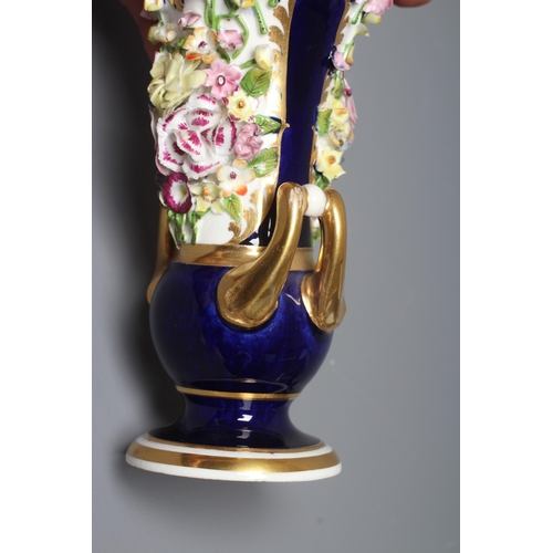 31 - A PAIR OF BLOOR DERBY PORCELAIN SMALL CAMPANA URNS encrusted with flowers on a gilt highlighted coba... 