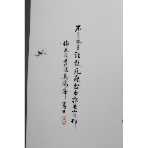 4 - A CHINESE PORCELAIN OBLONG PLAQUE, on glaze painted in pastel shades with a vignette of an aged trav... 