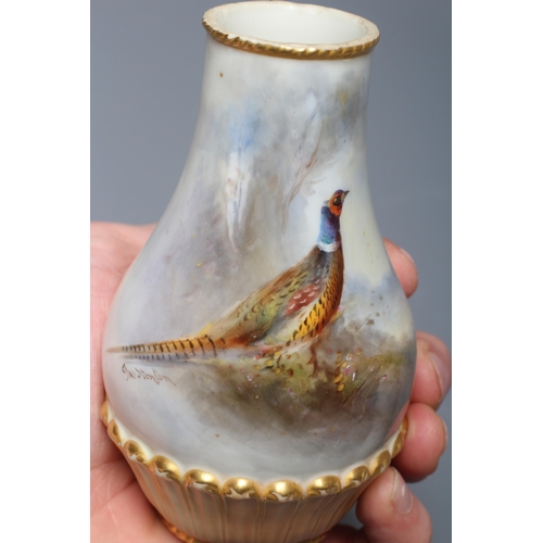40 - A ROYAL WORCESTER SMALL VASE, 1913, of baluster form with basket weave moulded lower section, painte... 