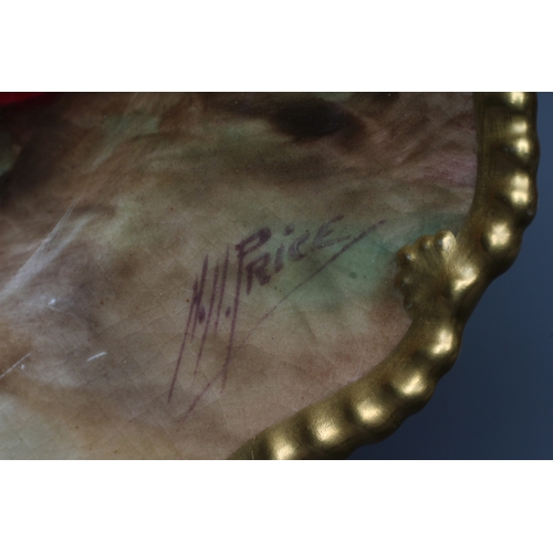 44 - A ROYAL WORCESTER CABINET PLATE, 1929, of shaped circular form with gilt highlighted gadrooned rim, ... 