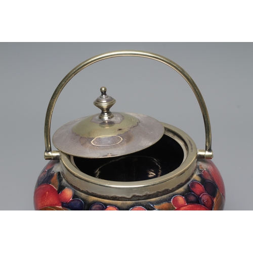 50 - A MOORCROFT POMEGRANATE BISCUIT BARREL, early 20th century, of inverted baluster form with EPNS moun... 