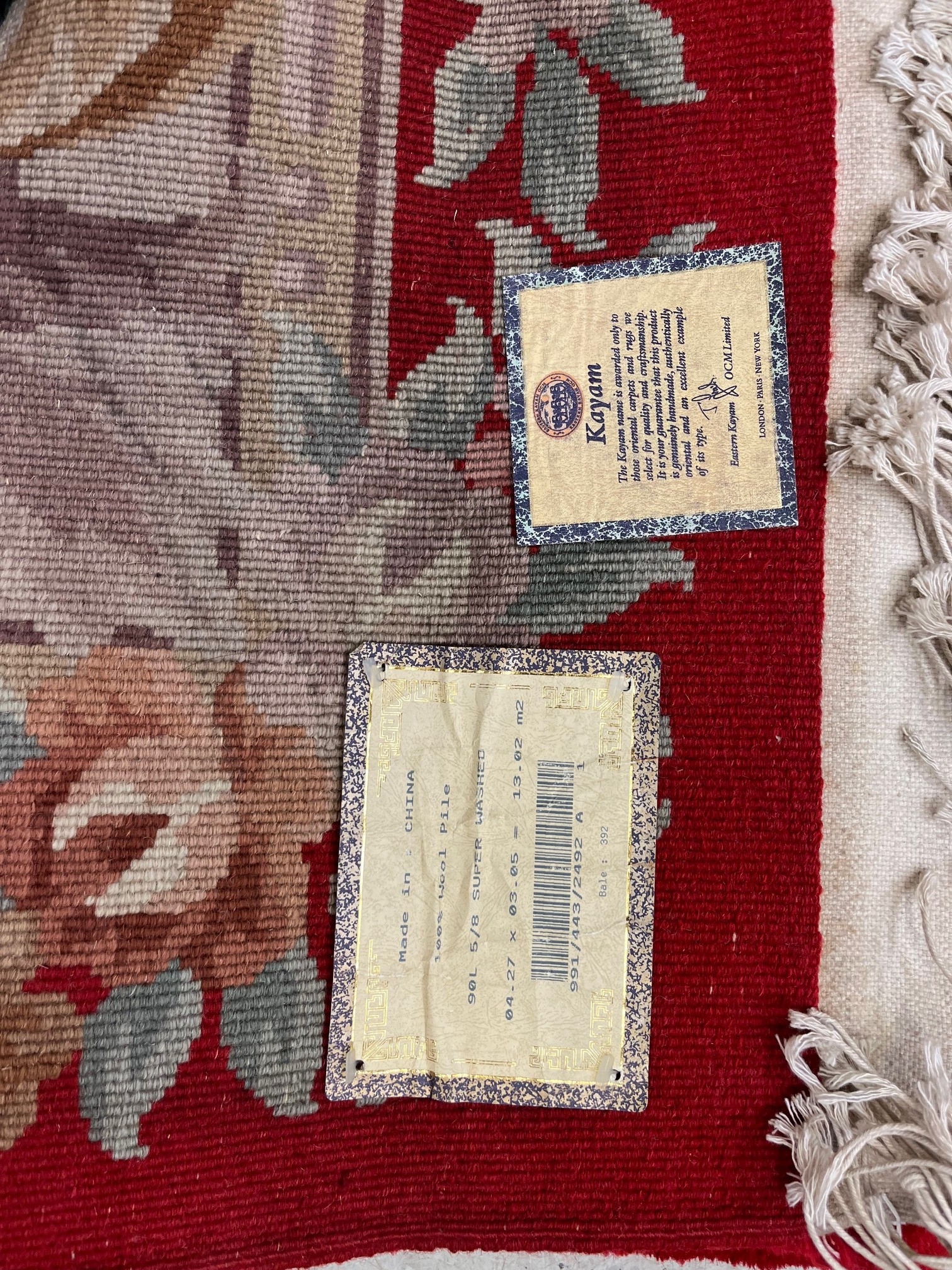 A CHINESE KAYAN CARPET, modern, the Aubusson design with cardinal red ...