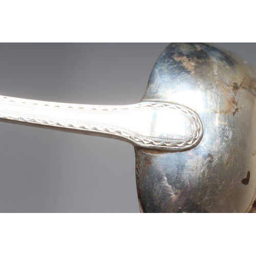 126 - A VICTORIAN SILVER HANOVARIAN PATTERN SOUP LADLE, maker's mark GA, London 1862, with bright cut engr... 