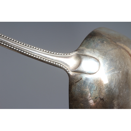 130 - A VICTORIAN SILVER BEAD PATTERN SOUP LADLE, maker's mark GA, London 1874, 13 1/4
