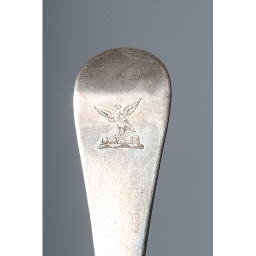 141 - A GEORGE III SILVER SHELL BACK MOTE SPOON by James Wilkes, maker's mark stamped twice only, with arr... 
