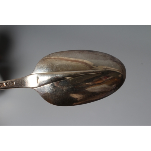 141 - A GEORGE III SILVER SHELL BACK MOTE SPOON by James Wilkes, maker's mark stamped twice only, with arr... 