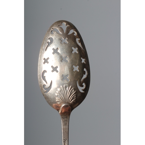 141 - A GEORGE III SILVER SHELL BACK MOTE SPOON by James Wilkes, maker's mark stamped twice only, with arr... 