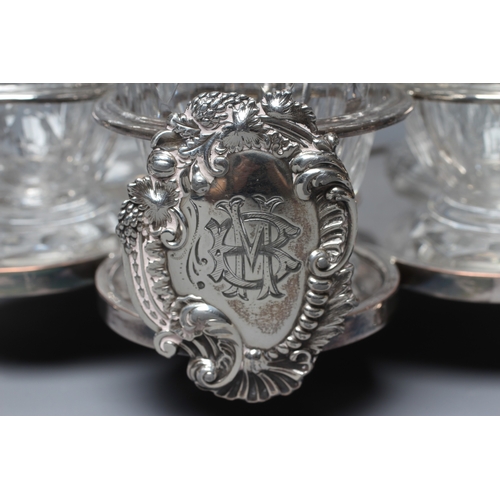 142 - A VICTORIAN OLD SHEFFIELD PLATE WARWICK CRUET, apparently unmarked, of typical form, the rococo cart... 